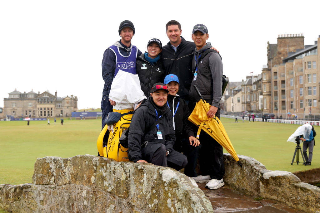 Lydia Ko of New Zealand pose for a photo with her caddie and team during a Pro-Am ahead of the AIG Women's Open